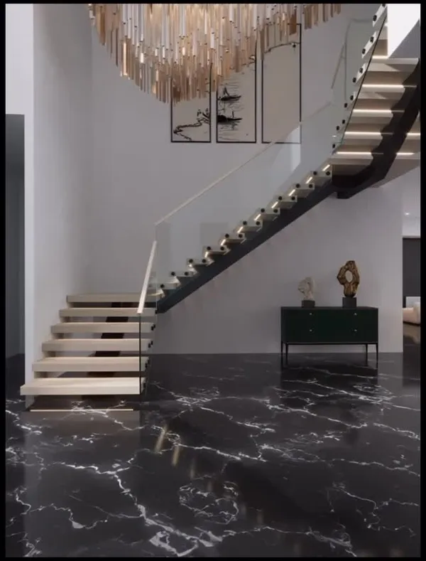 Completed custom floating staircase with white oak treads in a Nassau County home